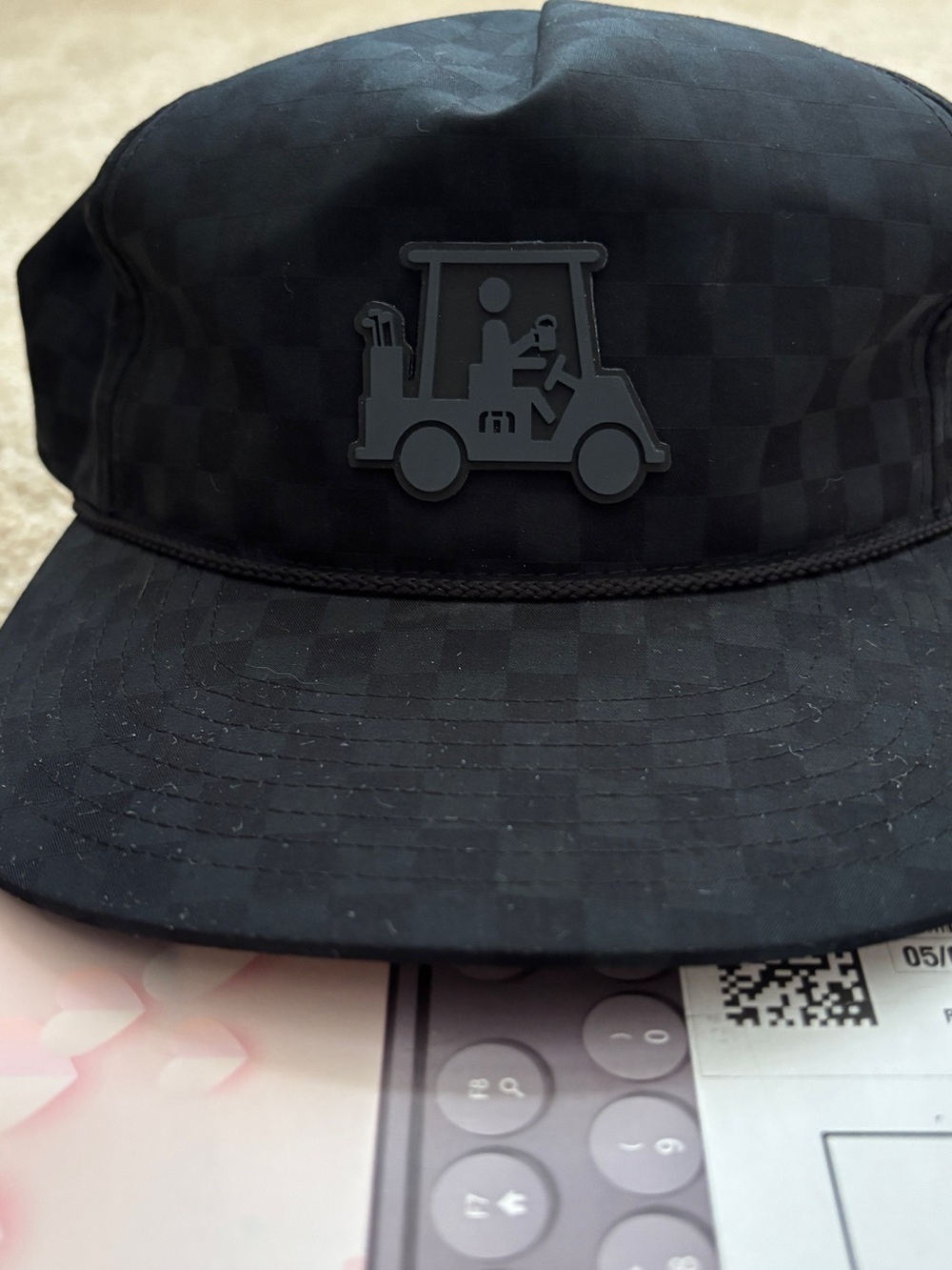 NWOT Travis Mathew black checkered hat